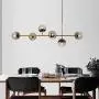 LITFAD Globe Shaped Island Lamp Smoke Gray Glass 6 Lights Dining Room Pendant Lighting Fixture Modern LED Chandelier in Brass Metal with Adjustable Cord for Bedroom Restaurant Hotel Bar