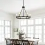 Merbotin Industrial Round Chandelier, 6-Light Wagon Wheel Chandeliers Rustic Ceiling Light Pendant Light for Kitchen Island Dining Room Foryer, Matte Black & Antique Brass Accents, 26'' Diameter