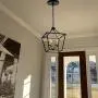JINZO Farmhouse Chandelier 4-Lights Rustic Cage Pendant Light Matt Black and Gold for Foyer Entryway Hallway Dining Room and Kitchen Island.