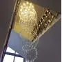 Contemporary Spiral Staircase Light 12-Lights Raindrop Crystal Chandeliers Modern Living Room Lighting Large High Ceiling Light Fixture for Hallway Foyer Hall