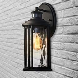 MOTINI 1-Light Outdoor Wall Sconce Lantern with Motion Sensor and Dusk to Dawn 60 W Bulb Included IP23 Waterproof Exterior Light Fixtures Wall Mount in Black Finish with Water Glass Shade