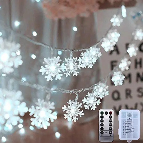 AODINI Christmas Decorations, 19.6 ft 40 LED Snowflake String Lights Battery Operated, 8 Modes Waterproof Christmas Lights with Remote for Xmas Party Garden Patio Bedroom Decor Indoor Outdoor AODINI Christmas Decorations, 19.6 ft 40 LED Snowflake String Lights Battery Operated, 8 Modes Waterproof Christmas Lights with Remote for Xmas Party Garden Patio Bedroom Decor Indoor Outdoor