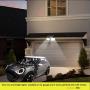DLLT Solar Security Lights Motion Sensor, Led Flood Light Outdoor, Solar Powered Wall Spotlight, 2 Adjustable Head Dusk to Dawn Lighting for Garage, Yard, Patio, Garden, Porch (Daylight 2 Mode) White