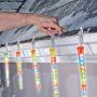 NOMA LED Quick-Clip Cascading Shooting Star Icicle Christmas Lights | Built-in Clip-On Icicle Lights | 10 Multi-Color Bulbs | 12.6 Ft. White Wire Strand NOMA LED Quick-Clip Cascading Shooting Star Icicle Christmas Lights | Built-in Clip-On Icicle Lights | 10 Multi-Color Bulbs | 12.6 Ft. White Wire Strand