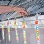 NOMA LED Quick-Clip Cascading Shooting Star Icicle Christmas Lights | Built-in Clip-On Icicle Lights | 10 Multi-Color Bulbs | 12.6 Ft. White Wire Strand 