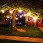 YVETTE LED Outdoor String Lights 25ft, Waterproof Backyard String Lights, Linkable ETL Approved 8 Base Sockets 2200K WarmWhite 9 S14 Bulbs(1 Spare) for BBQ Porch Wedding Garden Party (White)