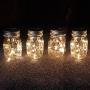 WERTIOO 4 Pack Solar Mason Jars Lights,30 LEDs Hanging Solar Lanterns Garden Decor Outdoor Lights Warm White Table Decor Fairy Lights for Patio Wedding Christmas Party (4 Pack)