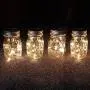 WERTIOO 4 Pack Solar Mason Jars Lights,30 LEDs Hanging Solar Lanterns Garden Decor Outdoor Lights Warm White Table Decor Fairy Lights for Patio Wedding Christmas Party (4 Pack)